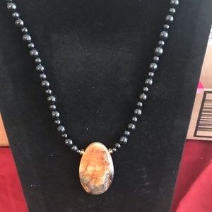 Black necklace with exquisite stone